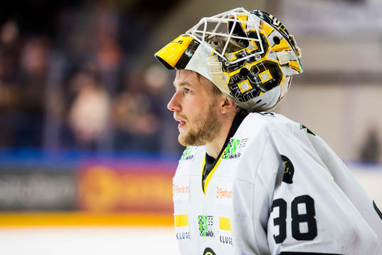 Goaltender Henrik Holm of Stavanger Oilers looks dejected