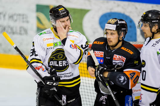 Lassi Kokkala of Stavanger Oilersand Fredrik Lystad