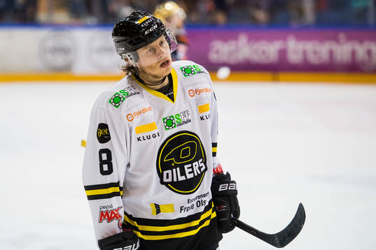 Mathias Trettenes of Stavanger Oilers looks dejected