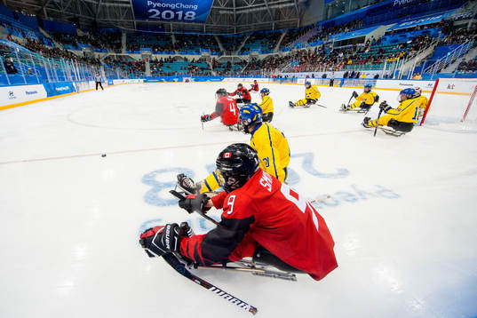 Corbyn Smith of Canada and Niklas Rakos of Sweden
