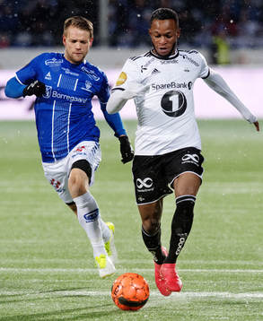 Ole Jörgen Halvorsen of Sarpsborg 08 and Samuel Adegbenro