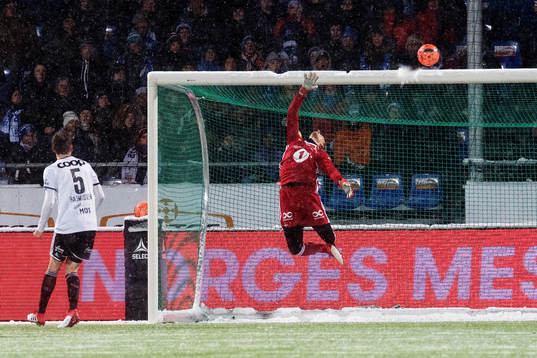 Goalkeeper André Hansen of Rosenborg sees the ball hit the