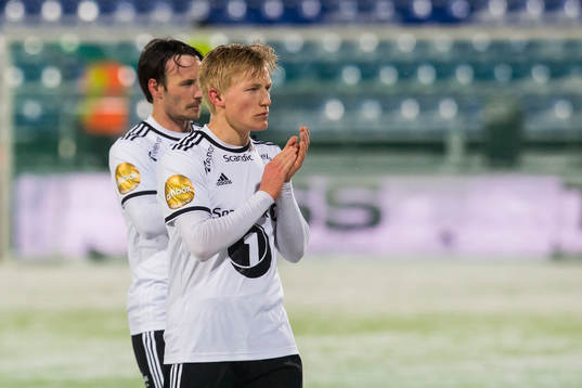 Mike Jensen and Birger Meling of Rosenborg look dejected