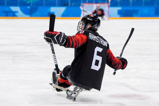 Rob Armstrong of Canada celebrates scoring a goal