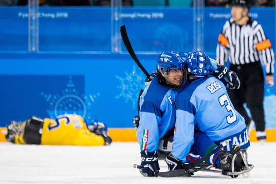 Gianluigi Rosa of Italy celebrates with teammate Gian Luca