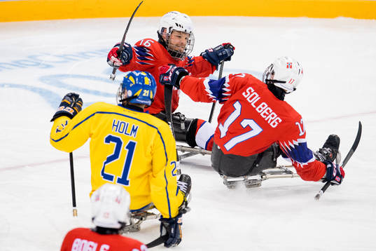 Knut André Nordstoga of Norway celebrates with teammate