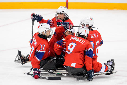 Knut André Nordstoga of Norway celebrates with teammates