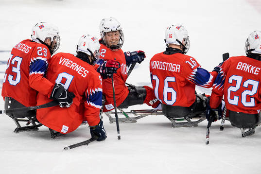 Magnus Bøgle of Norway celebrates with teammates