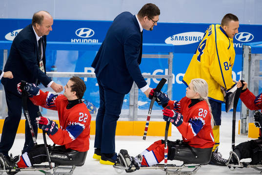 Erik Vikström, head coach of Sweden, and Lena Schrøder of