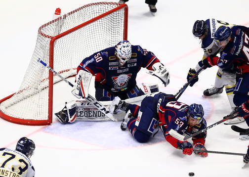 Linköpings målvakt Jonas Gustavsson, Eddie Larsson