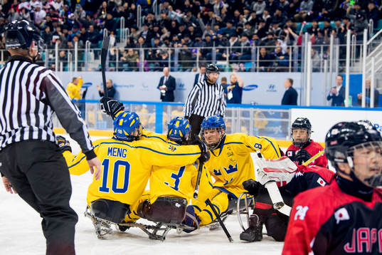 Niklas Ingvarsson of Sweden celebrates with teammates Robin