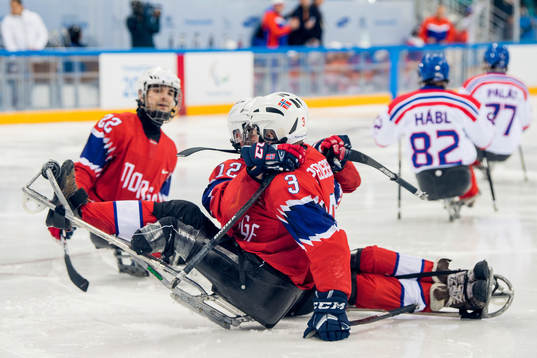 Rolf Einar Pedersen of Norway celebrates with teammates