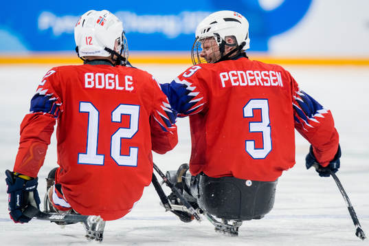 Rolf Einar Pedersen of Norway celebrates with Magnus Bøgle