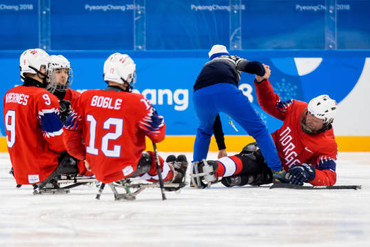 Rolf Einar Pedersen of Norway lies down with an injury