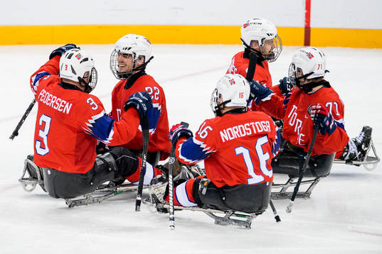 Audun Bakke of Norway celebrates with teammates