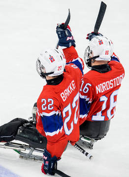 Audun Bakke of Norway celebrates with teammate Knut André