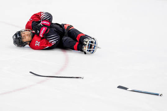 Daisuke Uehara of Japan lies down with an injury