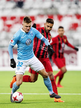 Malmö FFs Mattias Svanberg och Östersunds Saman Ghoddos i