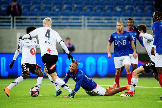 Chidera Ejuke of Vålerenga falls in the penalty area