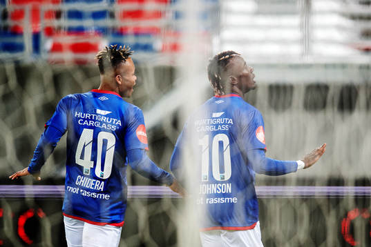 Chidera Ejuke celebrates with the goal scorer to 2-1 Sam