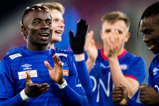 Sam Johnson of Vålerenga and Samuel Adekugbe of Vålerenga