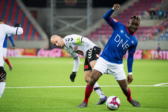 Jone Samuelsen of Odd and Sam Johnson of Vålerenga