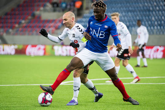 Jone Samuelsen of Odd and Sam Johnson of Vålerenga
