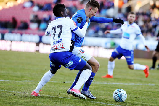 Christoffer Remmer of Molde and Babajide Akintola of