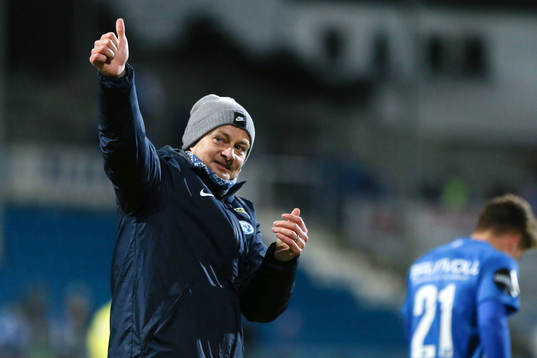 The manager of Molde, Ole Gunnar Solskjær celebrates at