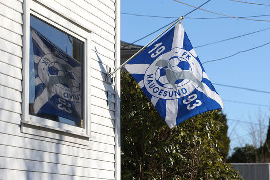 A Haugesund flag is flown outside a house in the town centre