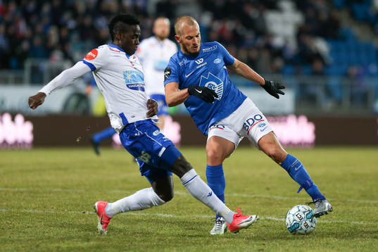 Eirik Hestad of Molde and Babajide Akintola of Haugesund