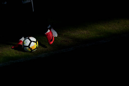 Shoes and a football