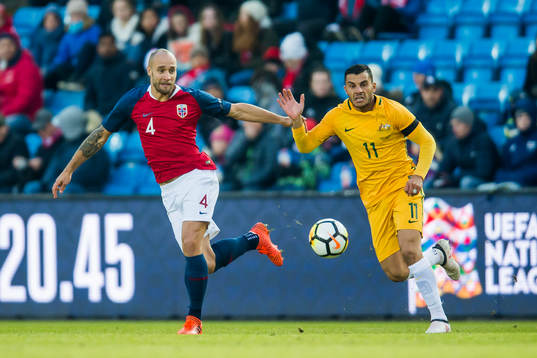 Tore Reginiussen of Norway and Andrew Nabbout of Australia