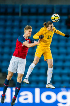 Kristoffer Ajer of Norway and Jackson Irvine of Australia