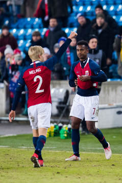 Birger Meling and Ola Kamara of Norway