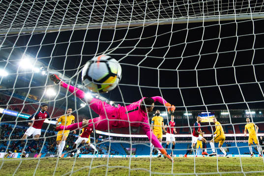 Tore Reginiussen of Norway  scores the 2-1 goal behind