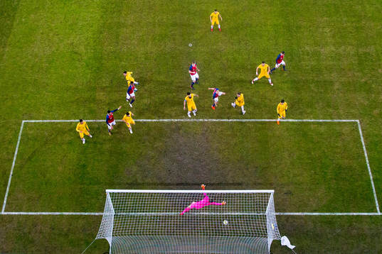 Tore Reginiussen of Norway scores 2-1 behind goalkeeper Mat