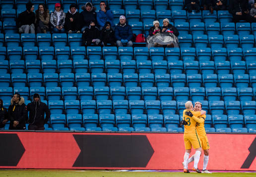 Aaron Mooy and Jackson Irvine of Australia celebrates the
