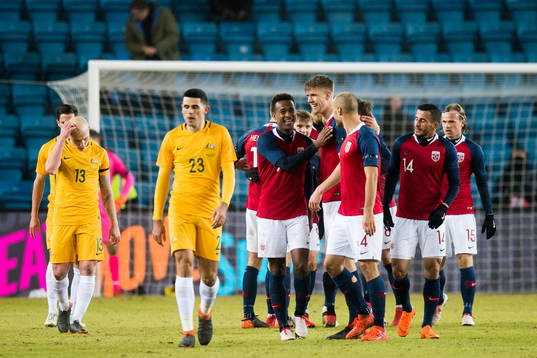 Ola Kamara and Kristoffer Ajer of Norway celebrate 4-1 with