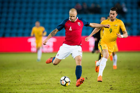 Tore Reginiussen of Norway and Tomi Juric of Australia