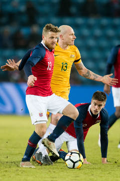 Fredrik Midtsjø of Norway and Aaron Mooy of Australia