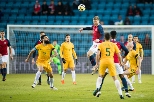 Mile Jedinak of Australia and Fredrik Midtsjø of Norway