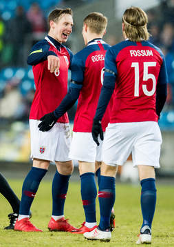 Stefan Johansen, Martin Ødegaard and Iver Fossum celebrate