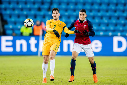 Mattew Leckie of Australia and Mohamed Elyounoussi of Norway