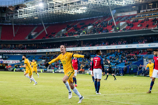 Jackson Irvine of Australia celebrates scoring 0-1