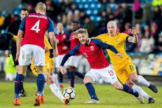 Fredrik Midtsjø of Norway and Aaron Mooy of Australia