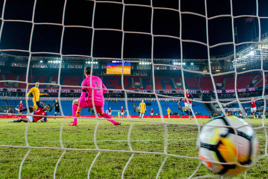 Ola Kamara of Norway scores 3-1 behind goalkeeper Mat Ryan