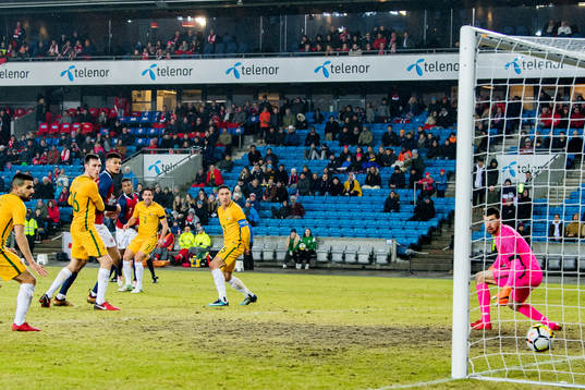 Ola Kamara of Norway scores 4-1 behind goalkeeper Mat Ryan