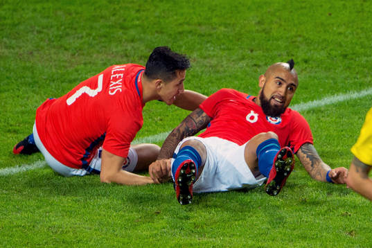 Chiles Alexis Sanchez och Arturo Vidal deppar