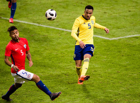 Chiles Paulo Diaz och Sveriges Martin Olsson